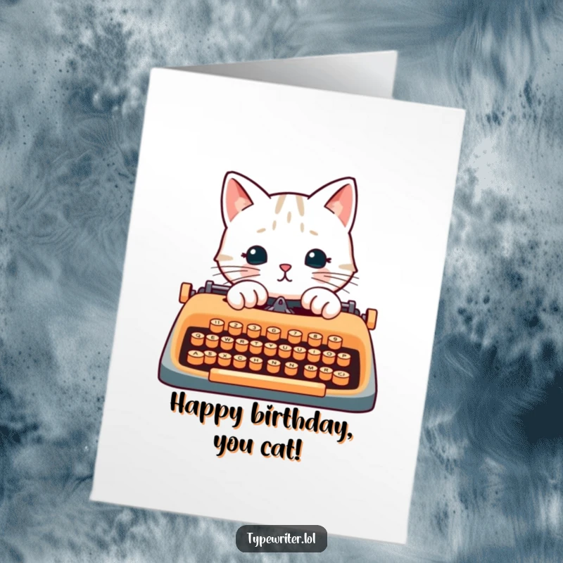 Funny Free Printable Birthday Card: A cat character enthusiastically pecks at typewriter keys with its paws, ready to wish you happy birthday.