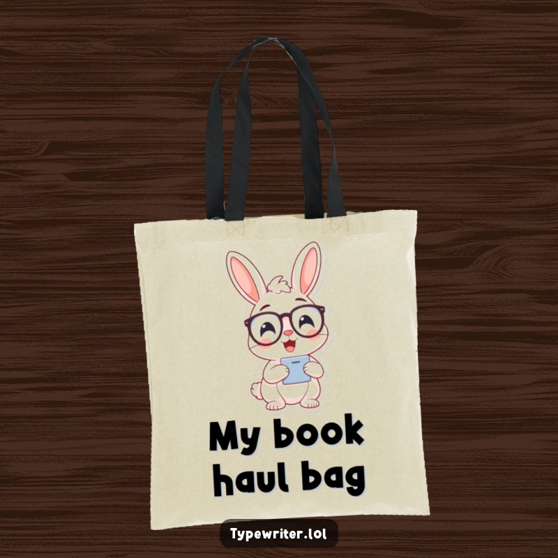 Funny bunny typist tote bag, depicting a cheerful bunny wearing spectacles and typing.